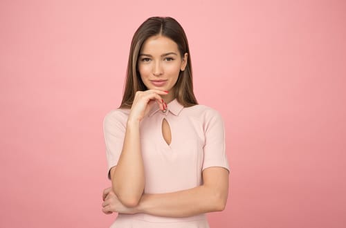 Woman wearing a pink top