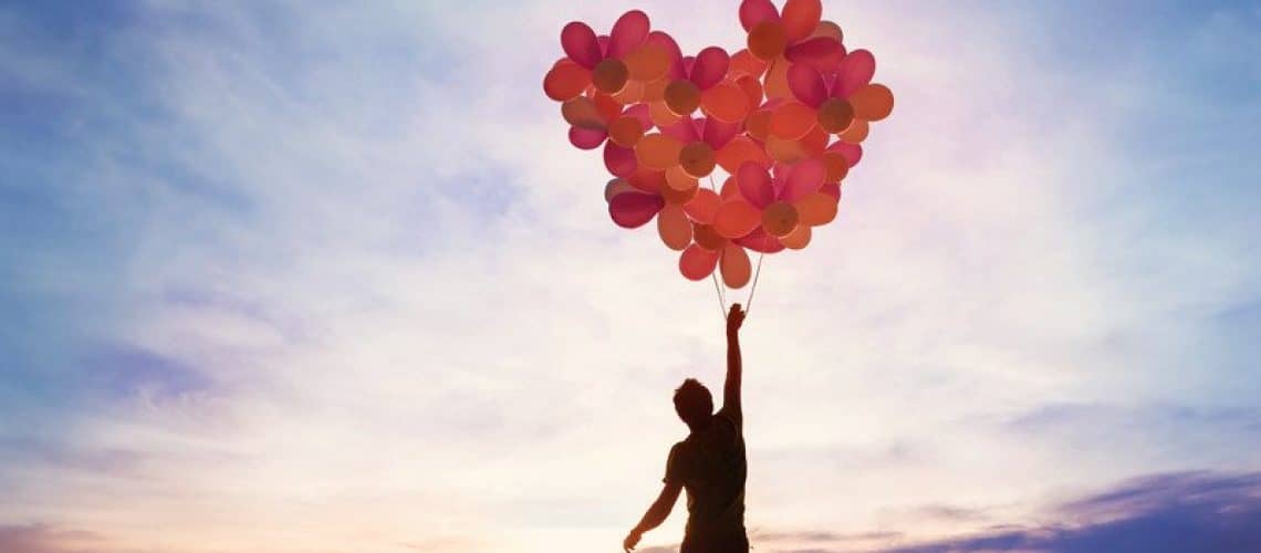 a child flying with a heart made of balloons, indicating the reward of Kindness.